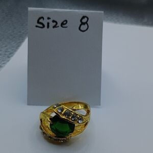 Elegant Gold and Green Gemstone Ring